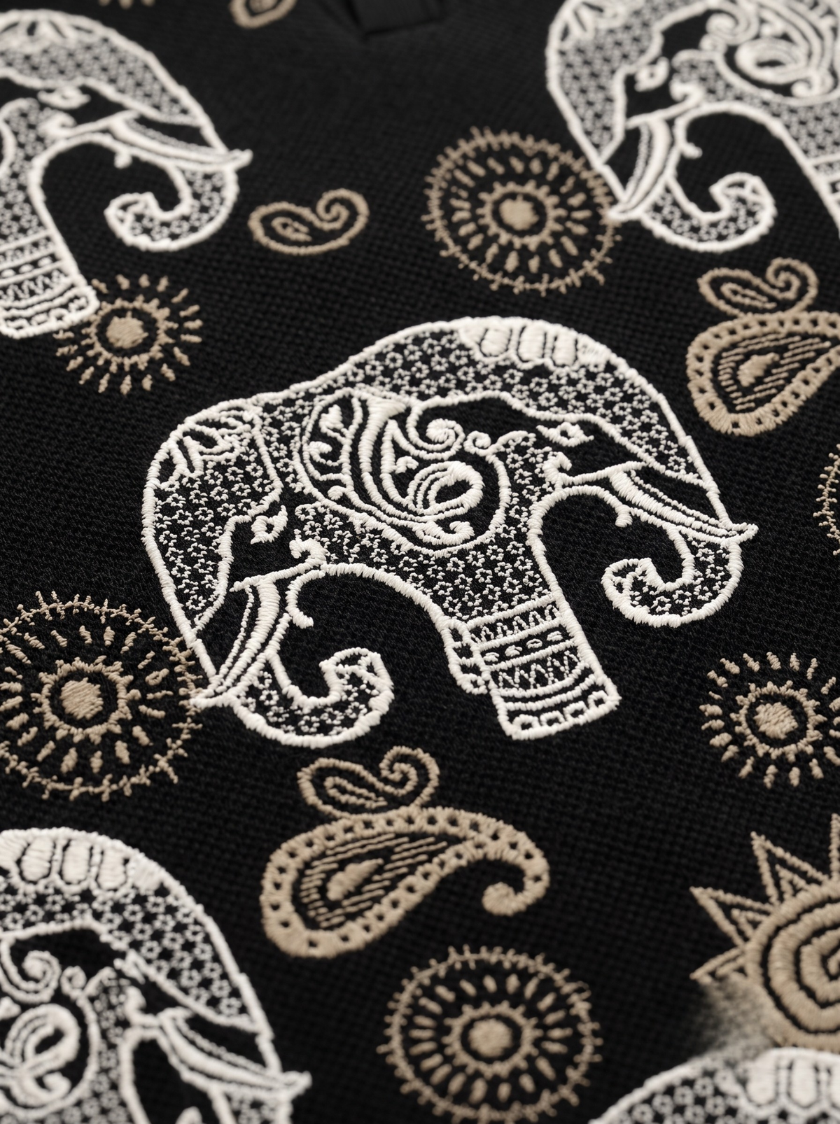 Noir Caravan Elephant Paisley Polo - Black & Beige by Cord Cult - detail view