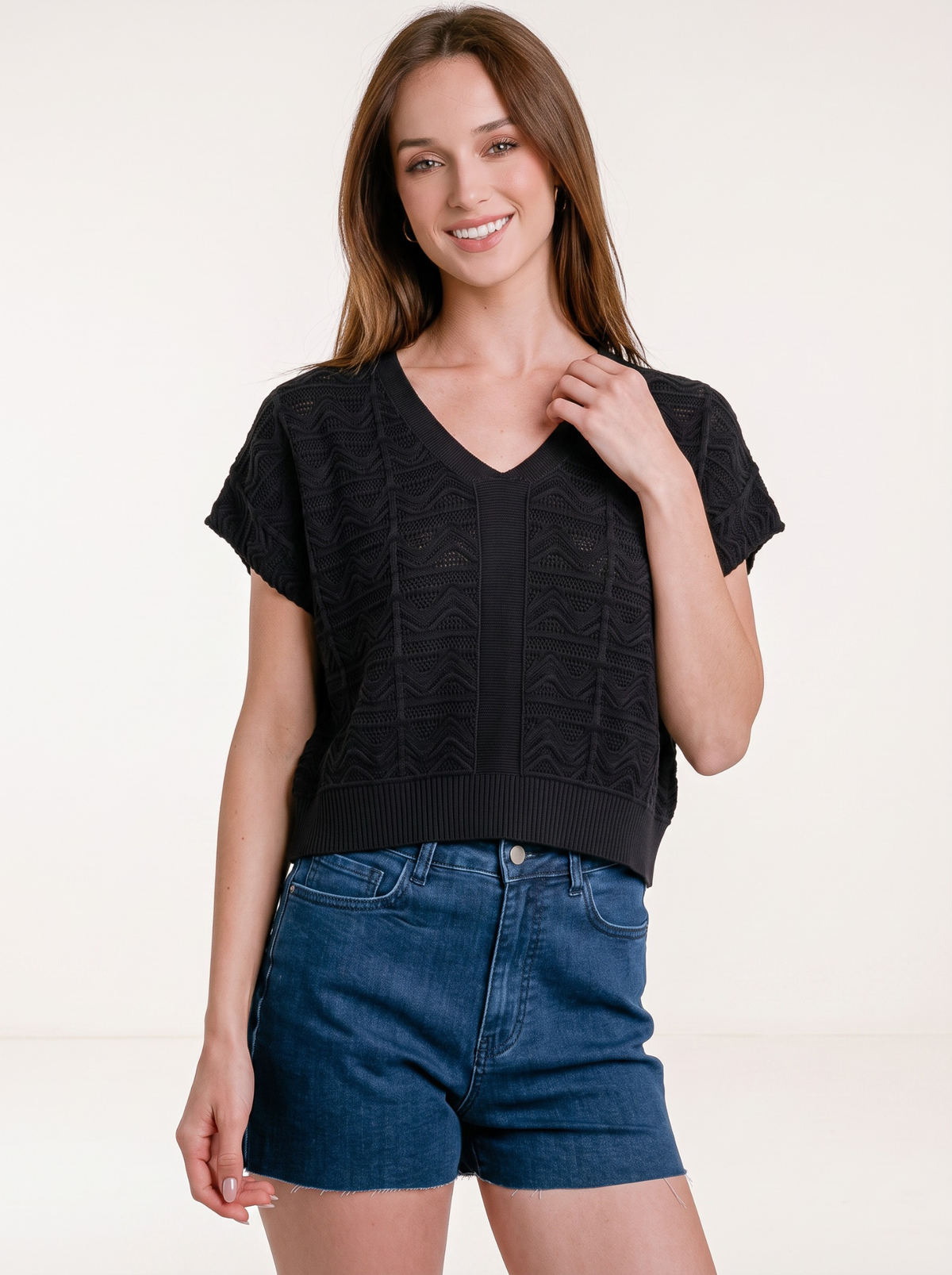 Midnight Noir Textured Knit Crop Top by Cord Cult - on-model view